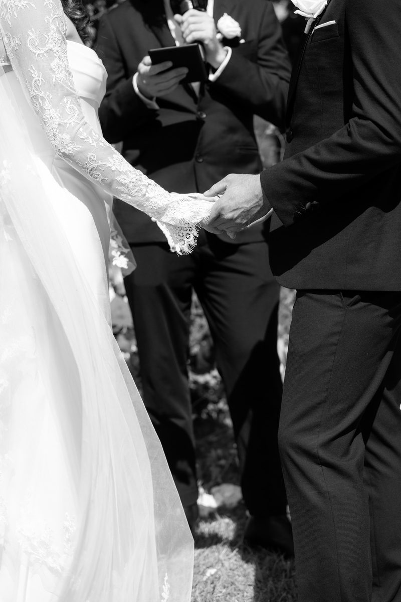 Exchanging rings, a black and white close-up